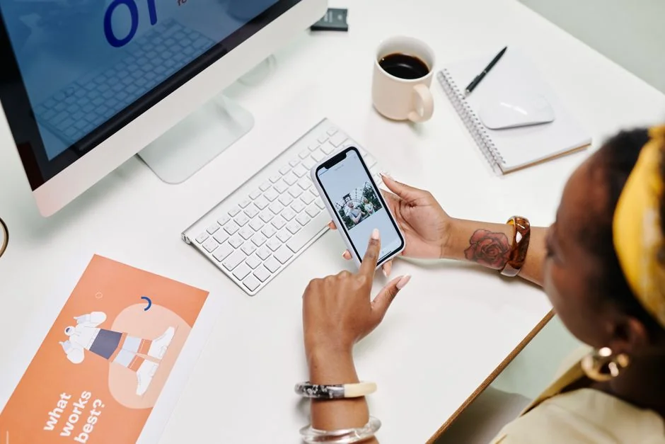 A contemporary workspace showcasing a laptop, tablet, and smartphones, ideal for tech and freelance use.